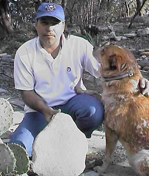 Randy, a metate, and his dog, Taz.